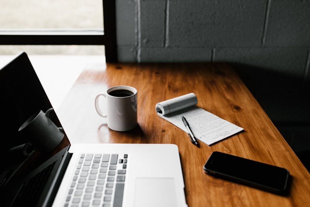 Designer planning a website layout at a desk